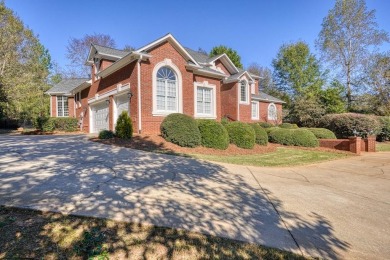 Welcome to this stunning 4-bedroom/4.5-bathroom home nestled on on The Carolina Country Club in South Carolina - for sale on GolfHomes.com, golf home, golf lot