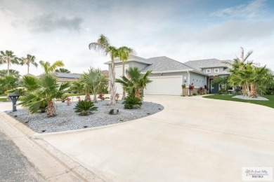 Spacious garage is 1242 sq ft which includes two car garage (24 on South Padre Island Golf Club in Texas - for sale on GolfHomes.com, golf home, golf lot