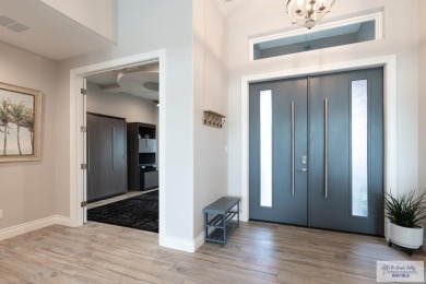 Spacious garage is 1242 sq ft which includes two car garage (24 on South Padre Island Golf Club in Texas - for sale on GolfHomes.com, golf home, golf lot