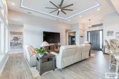 Spacious garage is 1242 sq ft which includes two car garage (24 on South Padre Island Golf Club in Texas - for sale on GolfHomes.com, golf home, golf lot