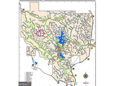 Tucked away in the serene beauty of Big Canoe, this heavily on Big Canoe Golf Club - Cherokee in Georgia - for sale on GolfHomes.com, golf home, golf lot