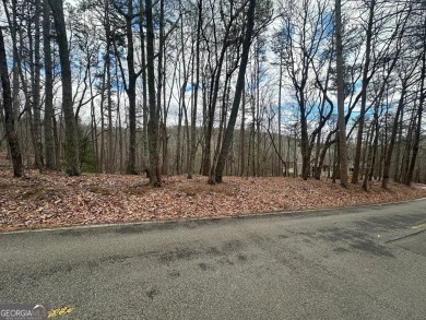 Tucked away in the serene beauty of Big Canoe, this heavily on Big Canoe Golf Club - Cherokee in Georgia - for sale on GolfHomes.com, golf home, golf lot