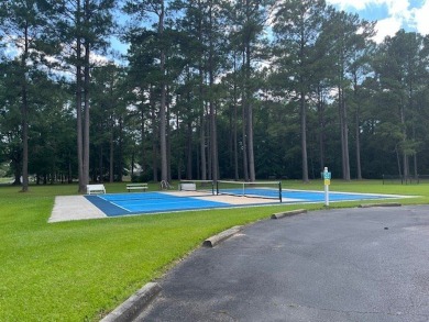 Vacant golf course lot - ready for approved patio home on Players Course At Wyboo Plantation in South Carolina - for sale on GolfHomes.com, golf home, golf lot