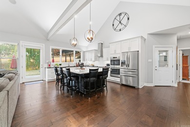 Beautifully set in a prestigious golf community, this inviting on Greystone Country Club in Arkansas - for sale on GolfHomes.com, golf home, golf lot