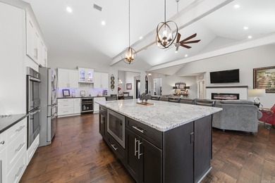 Beautifully set in a prestigious golf community, this inviting on Greystone Country Club in Arkansas - for sale on GolfHomes.com, golf home, golf lot