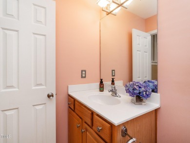 Charming home with a covered front porch and a back patio that on Stoney Creek Golf Club in North Carolina - for sale on GolfHomes.com, golf home, golf lot