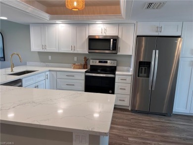 Best price on end unit in Kelly Greens! Completely renovated and on Kelly Greens Golf and Country Club in Florida - for sale on GolfHomes.com, golf home, golf lot