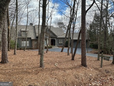 This gently sloping ~3/4-acre homesite is perfectly positioned on Big Canoe Golf Club - Cherokee in Georgia - for sale on GolfHomes.com, golf home, golf lot