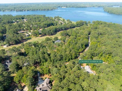 This beautiful, wooded lot on Snug Harbor in The Landing is the on Reynolds Lake Oconee - The Landing in Georgia - for sale on GolfHomes.com, golf home, golf lot