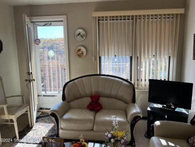 Discover this charming one-bedroom, one-bath apartment featuring on Silver Lake Golf Course in New York - for sale on GolfHomes.com, golf home, golf lot