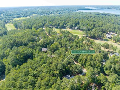 This beautiful, wooded lot on Snug Harbor in The Landing is the on Reynolds Lake Oconee - The Landing in Georgia - for sale on GolfHomes.com, golf home, golf lot