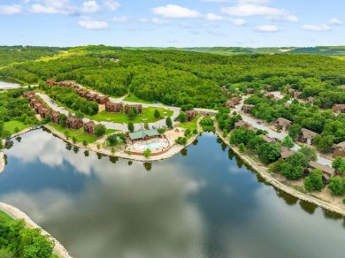 Welcome to your dream getaway at Stonebridge Lodge! This on Ledgestone Country Club and Golf Course in Missouri - for sale on GolfHomes.com, golf home, golf lot