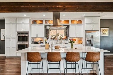 Designed with an inviting open concept layout, this home offers on Dallas Athletic Club in Texas - for sale on GolfHomes.com, golf home, golf lot