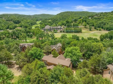 Welcome to your dream getaway at Stonebridge Lodge! This on Ledgestone Country Club and Golf Course in Missouri - for sale on GolfHomes.com, golf home, golf lot