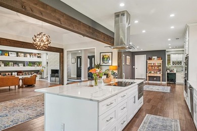 Designed with an inviting open concept layout, this home offers on Dallas Athletic Club in Texas - for sale on GolfHomes.com, golf home, golf lot
