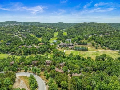 Welcome to your dream getaway at Stonebridge Lodge! This on Ledgestone Country Club and Golf Course in Missouri - for sale on GolfHomes.com, golf home, golf lot