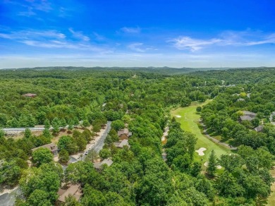 Welcome to your dream getaway at Stonebridge Lodge! This on Ledgestone Country Club and Golf Course in Missouri - for sale on GolfHomes.com, golf home, golf lot