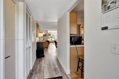 Stunning 1-bedroom, 1.5-bathroom ground-floor unit with a on Sunrise Lakes Phase III in Florida - for sale on GolfHomes.com, golf home, golf lot