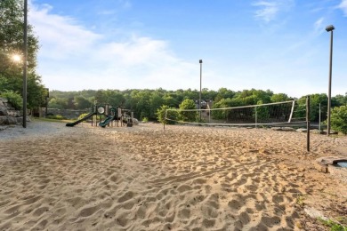 Welcome to your dream getaway at Stonebridge Lodge! This on Ledgestone Country Club and Golf Course in Missouri - for sale on GolfHomes.com, golf home, golf lot