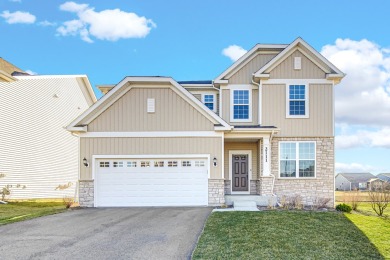 PREMIUM LOT | CONTINENTAL PLAN | SUN ROOM EXTENSION | POND VIEWS on Boulder Ridge Country Club in Illinois - for sale on GolfHomes.com, golf home, golf lot