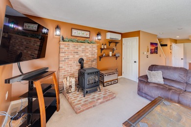 This 2-bedroom townhouse offers the perfect blend of comfort and on White Mountain Country Club in New Hampshire - for sale on GolfHomes.com, golf home, golf lot