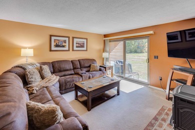 This 2-bedroom townhouse offers the perfect blend of comfort and on White Mountain Country Club in New Hampshire - for sale on GolfHomes.com, golf home, golf lot