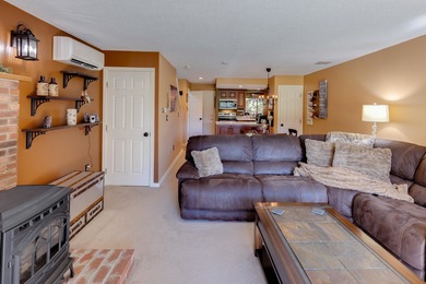 This 2-bedroom townhouse offers the perfect blend of comfort and on White Mountain Country Club in New Hampshire - for sale on GolfHomes.com, golf home, golf lot