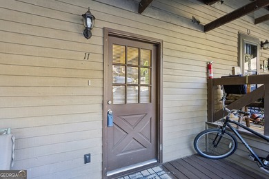 Step into resort-style living with this charming 2-bedroom, 2 on The Highlands Course at Lake Arrowhead in Georgia - for sale on GolfHomes.com, golf home, golf lot