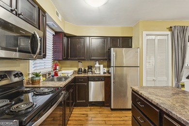 Step into resort-style living with this charming 2-bedroom, 2 on The Highlands Course at Lake Arrowhead in Georgia - for sale on GolfHomes.com, golf home, golf lot