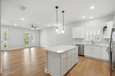 Welcome Home to luxury in this 2BD/2BA/2CG cottage home on an on Venetian Bay Golf Course in Florida - for sale on GolfHomes.com, golf home, golf lot