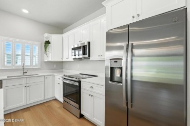 Welcome Home to luxury in this 2BD/2BA/2CG cottage home on an on Venetian Bay Golf Course in Florida - for sale on GolfHomes.com, golf home, golf lot