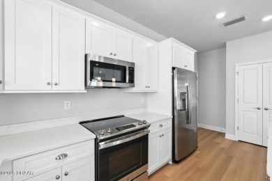 Welcome Home to luxury in this 2BD/2BA/2CG cottage home on an on Venetian Bay Golf Course in Florida - for sale on GolfHomes.com, golf home, golf lot