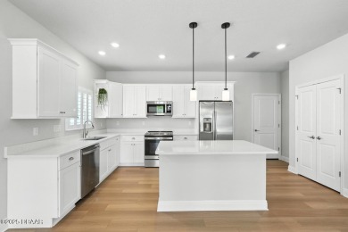 Welcome Home to luxury in this 2BD/2BA/2CG cottage home on an on Venetian Bay Golf Course in Florida - for sale on GolfHomes.com, golf home, golf lot
