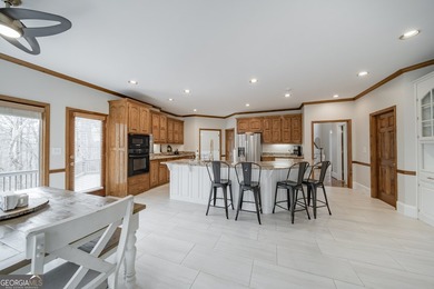 Tucked within the sought-after Estates section of Horseshoe Bend on Horseshoe Bend Country Club in Georgia - for sale on GolfHomes.com, golf home, golf lot