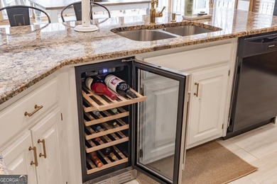 Tucked within the sought-after Estates section of Horseshoe Bend on Horseshoe Bend Country Club in Georgia - for sale on GolfHomes.com, golf home, golf lot