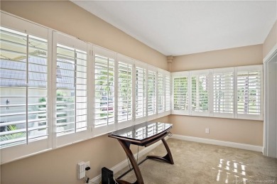 Enjoy courtyard views from this renovated, 2cd floor condo in on Martin County Golf Course in Florida - for sale on GolfHomes.com, golf home, golf lot