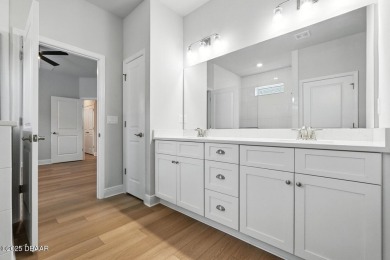 Welcome Home to luxury in this 2BD/2BA/2CG cottage home on an on Venetian Bay Golf Course in Florida - for sale on GolfHomes.com, golf home, golf lot