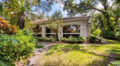 Serene, easy-living villa with treed views in the prestigious on The Meadows Golf and Country Club in Florida - for sale on GolfHomes.com, golf home, golf lot