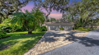 Serene, easy-living villa with treed views in the prestigious on The Meadows Golf and Country Club in Florida - for sale on GolfHomes.com, golf home, golf lot