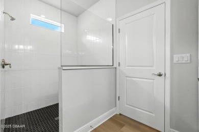 Welcome Home to luxury in this 2BD/2BA/2CG cottage home on an on Venetian Bay Golf Course in Florida - for sale on GolfHomes.com, golf home, golf lot