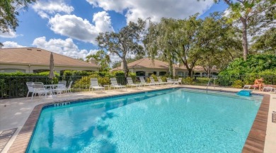 Serene, easy-living villa with treed views in the prestigious on The Meadows Golf and Country Club in Florida - for sale on GolfHomes.com, golf home, golf lot