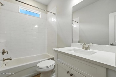 Welcome Home to luxury in this 2BD/2BA/2CG cottage home on an on Venetian Bay Golf Course in Florida - for sale on GolfHomes.com, golf home, golf lot