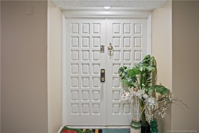 Enjoy courtyard views from this renovated, 2cd floor condo in on Martin County Golf Course in Florida - for sale on GolfHomes.com, golf home, golf lot