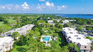 Enjoy courtyard views from this renovated, 2cd floor condo in on Martin County Golf Course in Florida - for sale on GolfHomes.com, golf home, golf lot