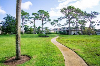 Enjoy courtyard views from this renovated, 2cd floor condo in on Martin County Golf Course in Florida - for sale on GolfHomes.com, golf home, golf lot