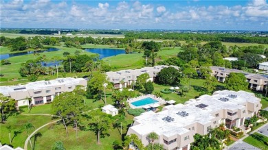 Enjoy courtyard views from this renovated, 2cd floor condo in on Martin County Golf Course in Florida - for sale on GolfHomes.com, golf home, golf lot