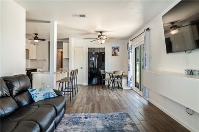 Enjoy island living in this beautifully updated 2 bedroom, 1 on Palmilla Beach Golf Club in Texas - for sale on GolfHomes.com, golf home, golf lot