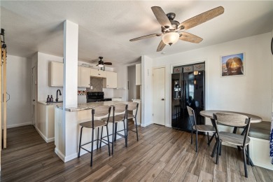Enjoy island living in this beautifully updated 2 bedroom, 1 on Palmilla Beach Golf Club in Texas - for sale on GolfHomes.com, golf home, golf lot