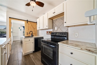Enjoy island living in this beautifully updated 2 bedroom, 1 on Palmilla Beach Golf Club in Texas - for sale on GolfHomes.com, golf home, golf lot