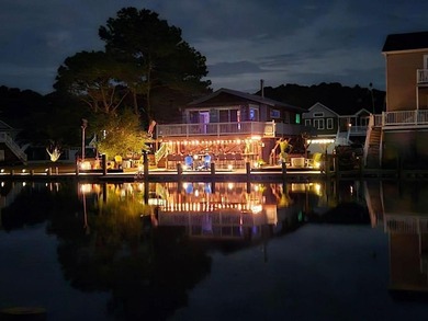 INCREDIBLE WATERFRONT WONDERLAND in Captain's Cove Golf & Yacht on Captains Cove Golf and Yacht Club in Virginia - for sale on GolfHomes.com, golf home, golf lot